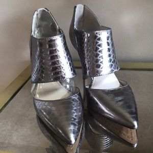 Vince Camuto metallic pumps.